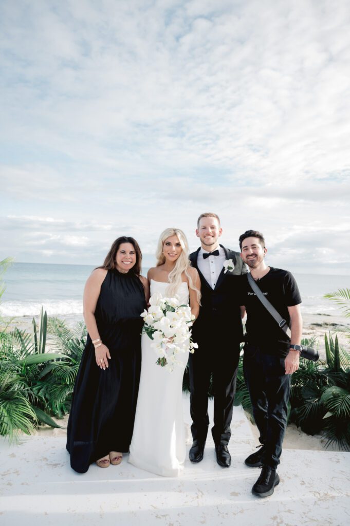 Carolyn and Seth’s beach ceremony at Valentin Imperial Riviera Maya with elegant black tie attire